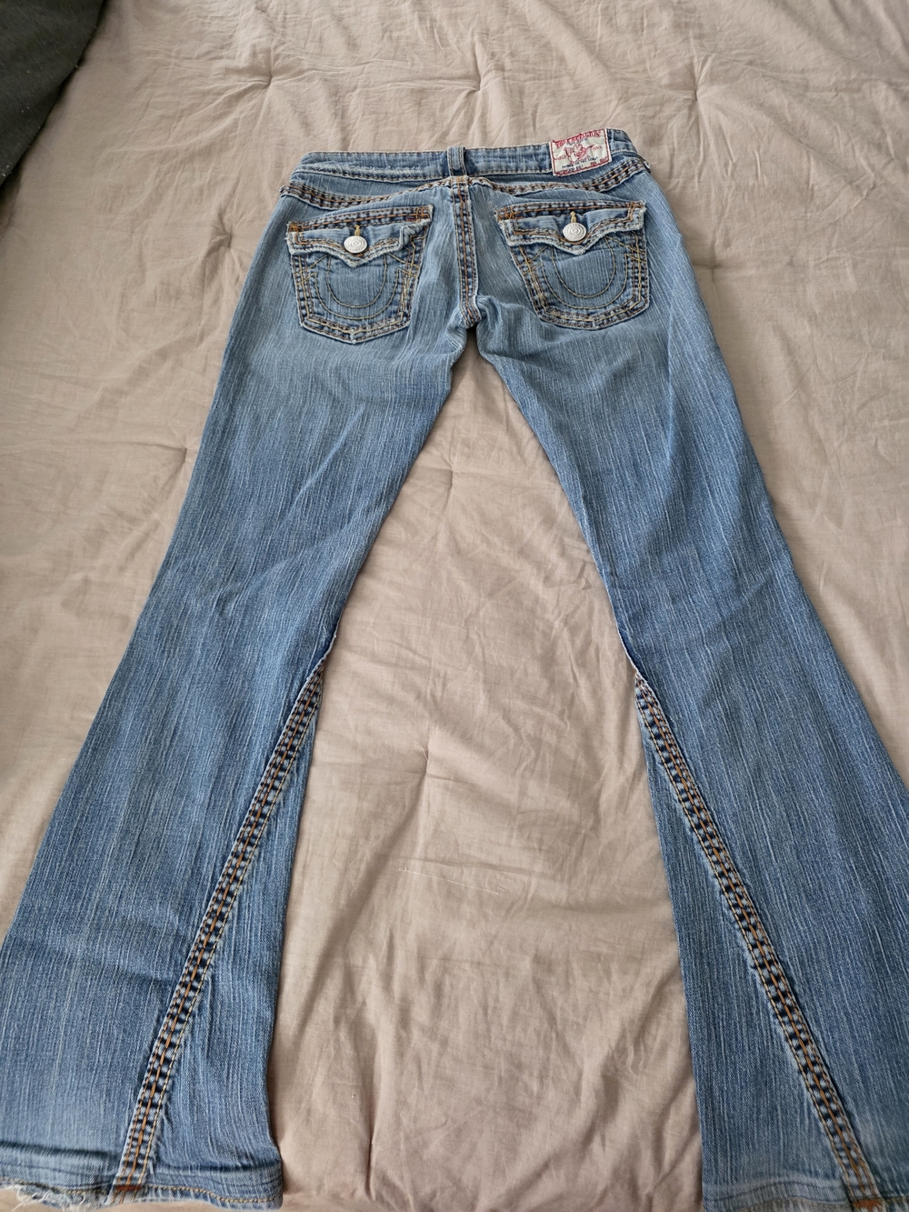 True Religion Light Blue Flare Jeans with Contrast Inner Seam Trim